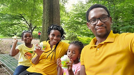 On a visit last summer to Central Park in New York City, Michael Okwori with, from left, daughter, Grace; wife, Kate; and daughter, Marvella