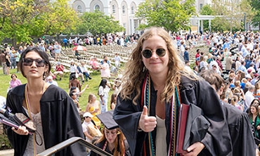 Students process into the Nott Memorial carrying their diplomas.