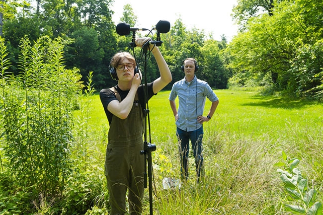 Aspen Morris ’25 and Christopher Chandler, assistant professor of music, capture the sound of birds and the environment in Jackson's Garden. 