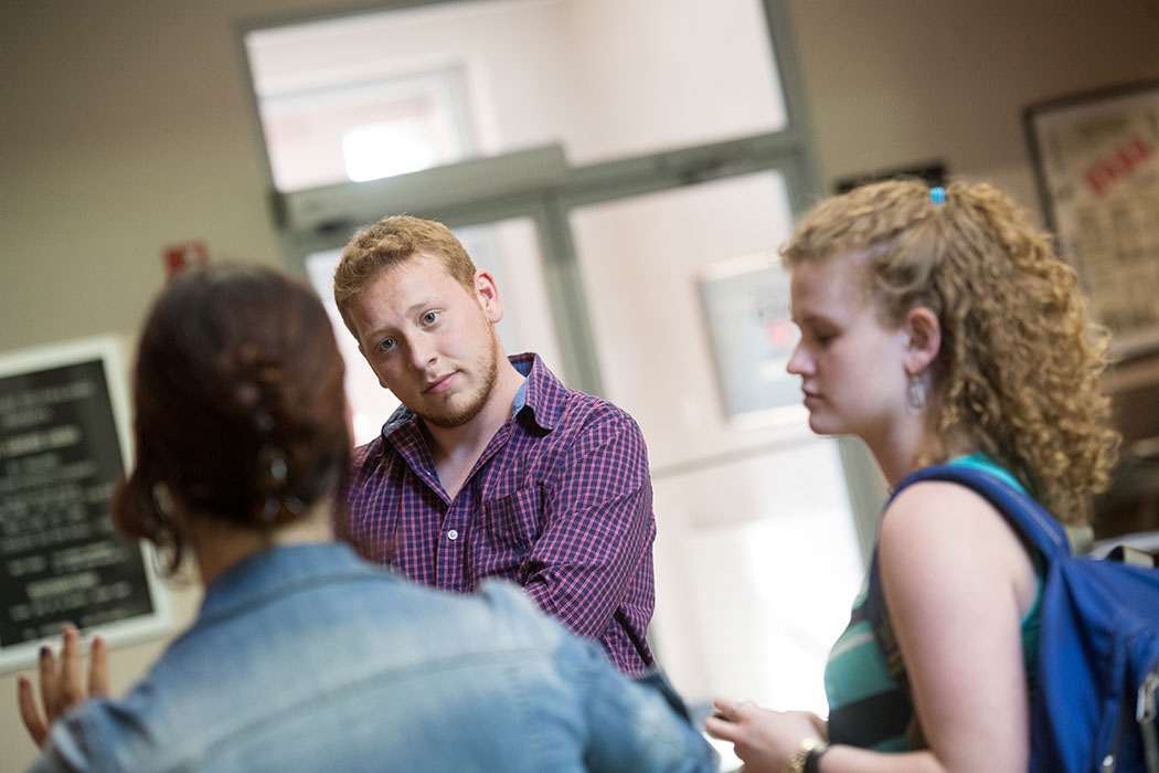 Students gather in the Yulman Theater lobby for conversation of the latest theatrical production.