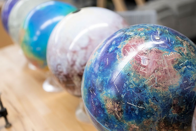 Globes lined up in one of the classrooms in the ISEC building.