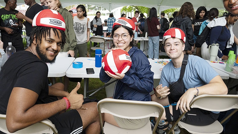 Students at a table at Club Expo