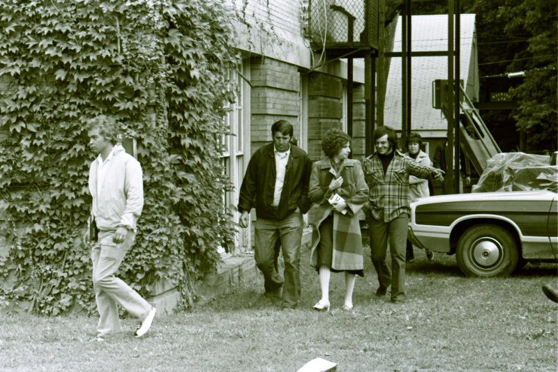 Barbra Streisand being escorted to one of the filming location on campus To her right is the side of Reamer Campus Center.