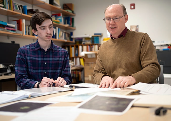 Devin Ramos ’25 with  Francis Wilkin, a senior lecturer in the Department of Physics and Astronomy