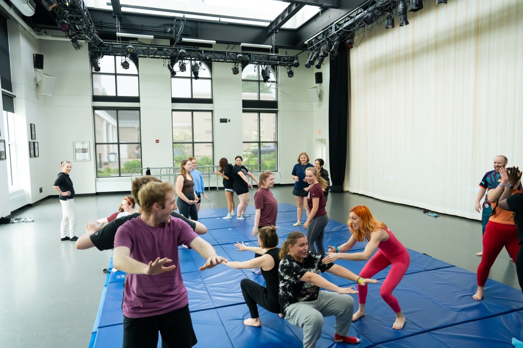 Students take circus arts workshop.