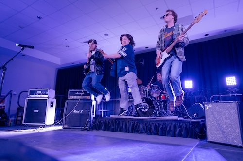 On the warmest day of the year, when students emerged from hibernation to excitedly awaken the campus from its winter slumber, four musicians crowded into a cramped space of the WRUC studios on the fourth floor of Reamer Campus Center. Performing as Nott Logical, the four – Cray Case ‘25, Sam Dickinson ’27, Alex Ottavio ’25 and Gianna Talarico ’25 – forgo the sun on this early weeknight to rehearse for two hours. Before long, they launch into “Take Me Out” the 2004 hit by Scottish indie rock band Franz Ferd