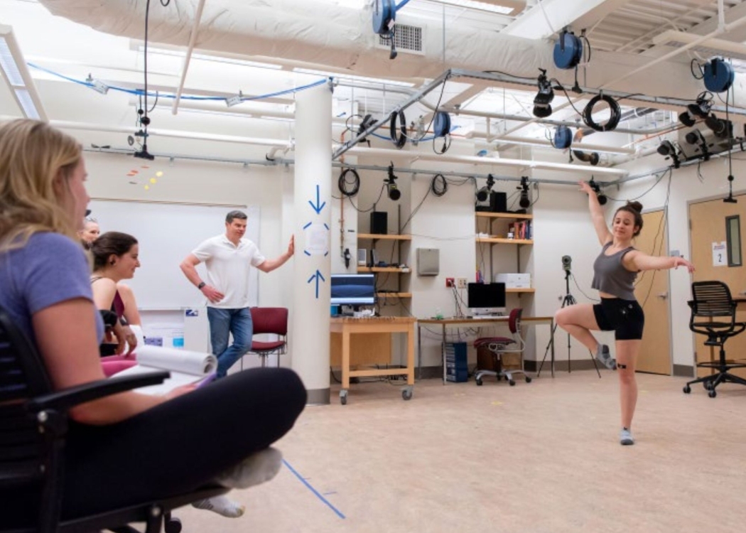 Student in dance position in a Science of Human Movement class