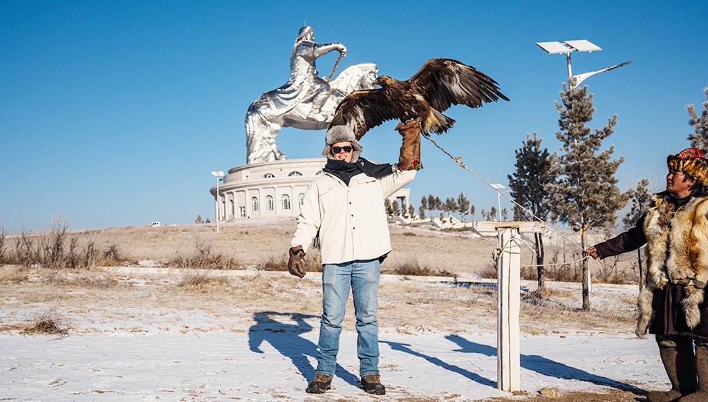 Luke MacDonald tries out some falconery in Mongolia