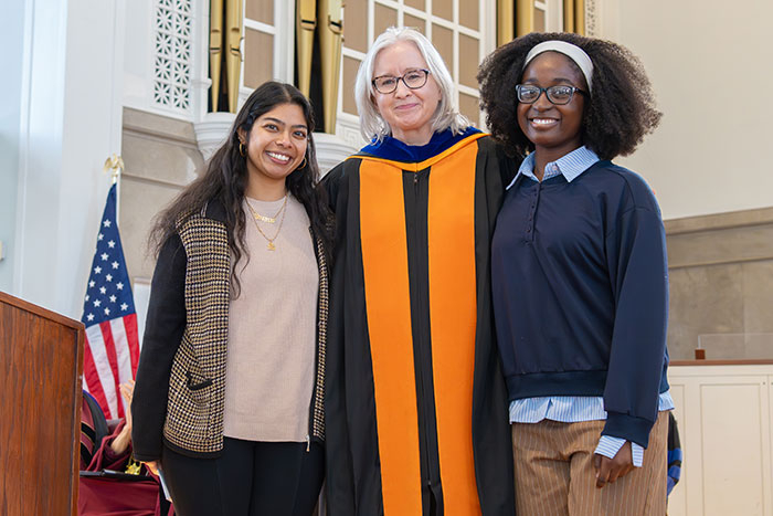 Michele Angrist, the Stephen J. and Diane K. Ciesinski Dean of the Faculty and Vice President for Academic Affairs, center, with Ishrat Chowdhury, left, and  Esther Adetutu ’28, right.