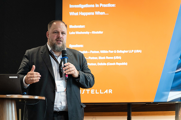 Luke Wochensky ’02 speaks at Compliance Day in Prague.