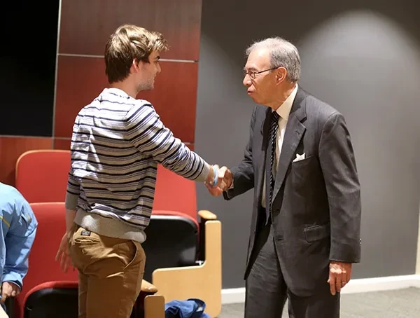 Norton Reamer meets with a student