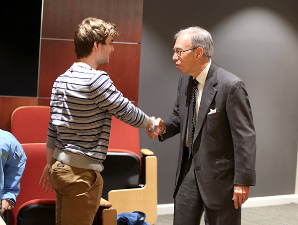 Norton Reamer meets with a student