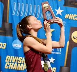 Ashley kisses trophy