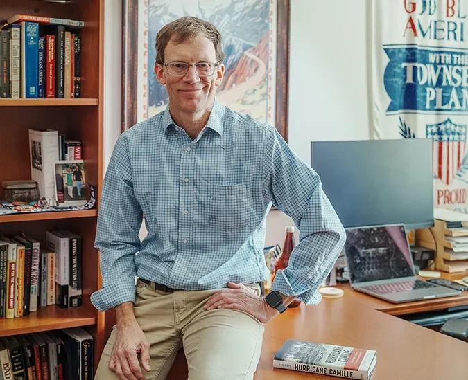 Andy Morris seated in his office