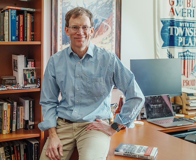 Andy Morris seated in his office