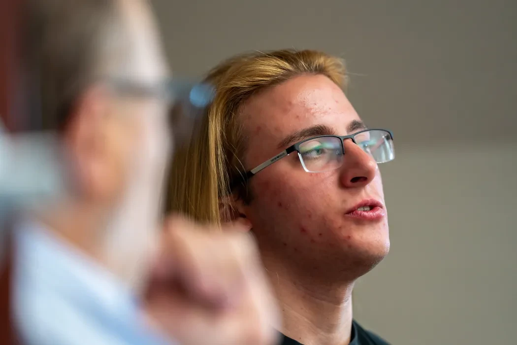 student talks