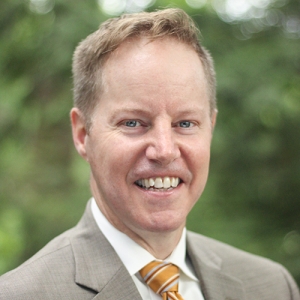 Derek Zuckerman headshot