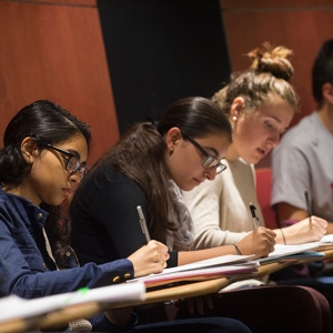 Students taking notes during a psychology class at Union College