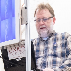 Aaron Cass, associate professor of Computer Science 