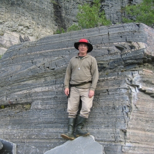 Kurt T. Hollocher standing in front of a large rock formation