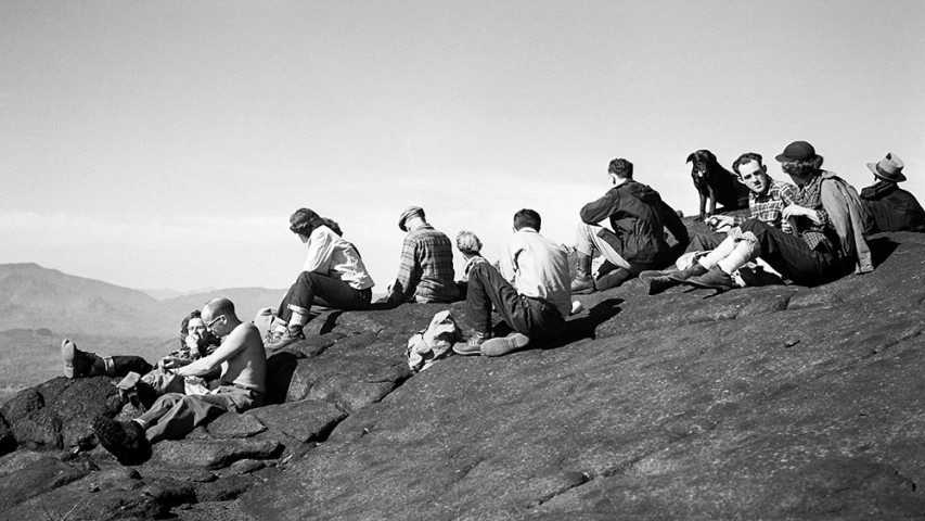 Flickinger Collection: Lunch on Saddleback Mountain Large group of hikers eating on mountain peak