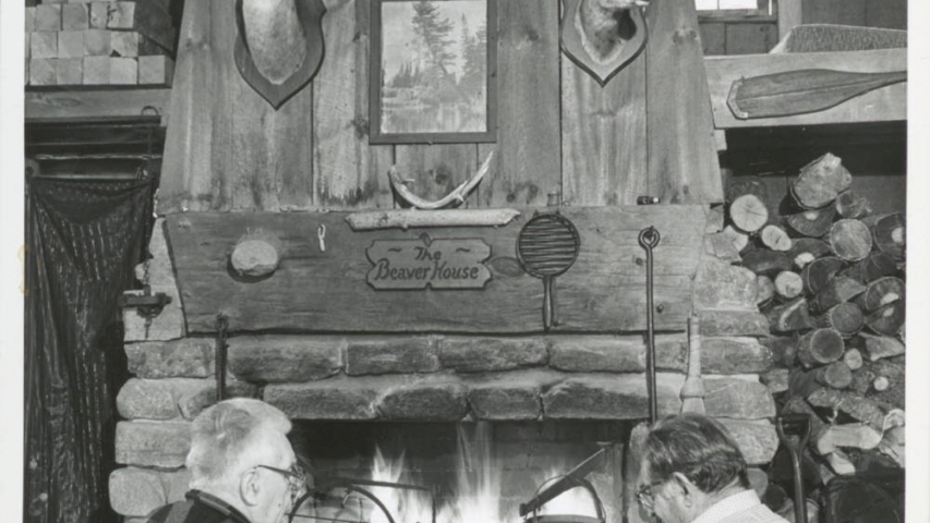 Schaefer Collection: Beaver House Meeting Paul Schaefer and an unidentified man in front of the fireplace at the Beaver House circa 1975.