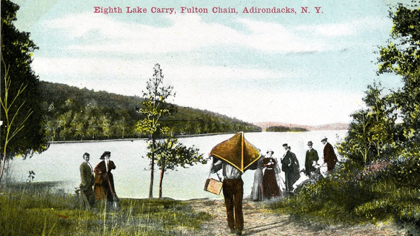 Postcard Collection: Eighth Lake Carry Fulton Chain Man carrying canoe to forest lake.