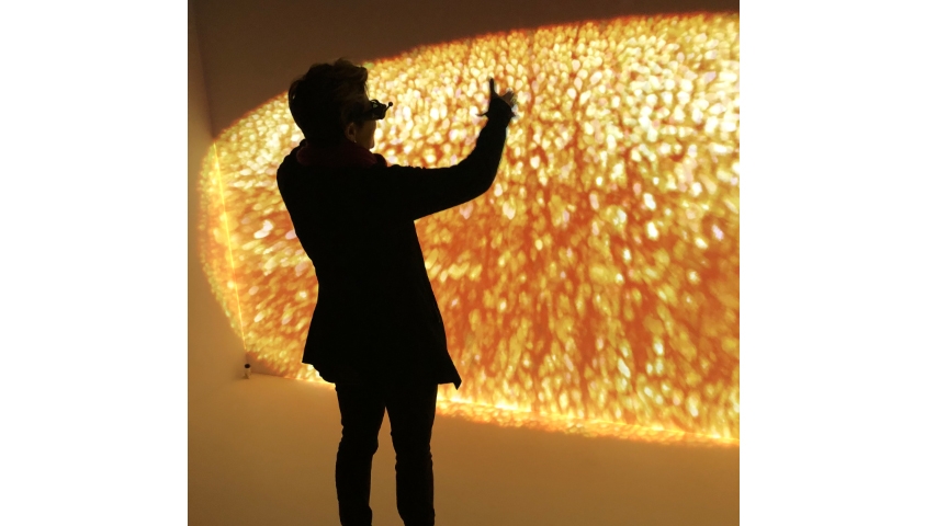 Prof. Theodosiou in Dresden conducting a Drosophila embryo in a virtual reality cave.