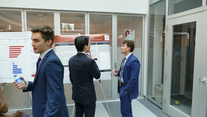 Stephen Gauta presenting his research at the 1st annual Combined Degree Student Research symposium