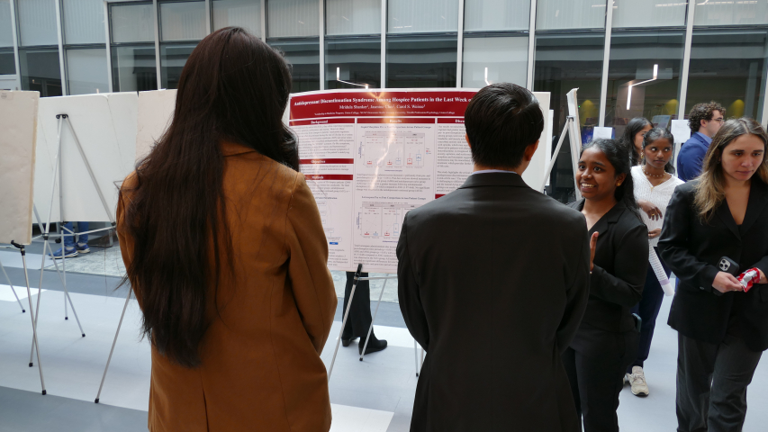 Mridula Shanker '26 presenting her research to students at the 1st annual Combined Degree Student Research symposium