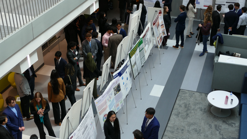 Presenters and guests on the 1st floor of ISEC Atrium at the 1st annual Combined Degree Student Research Symposium