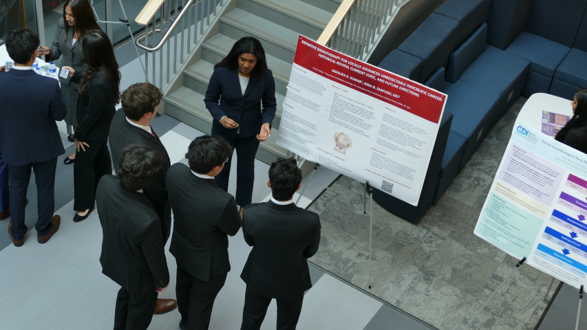 Anjalike Kumar '28 presenting her research to students at the 1st annual Combined Degree Student Research symposium