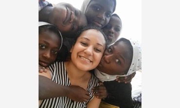 Aubrey Griffin ’17 with some of the students she worked with at the Islamic school in Rahmatown, Ghana.