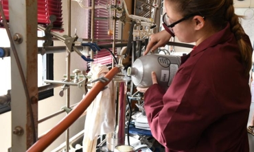 Samantha Gavin '19 works in Chemistry Professor Laurie Tyler's lab on her project, "Synthesis and Characterization of Isotopically Labelled Cobalt and Zinc Trans-Dicyano Complexes."