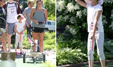 Gracie Keat, 6, tested her miniature golf skills against a trio of robots designed by students in a mechanical engineering class.