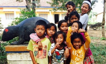 Lakhena Leang ’19 with local school children in one of Cambodia's provinces, Kampong Speu. She taught children how to properly wash their hands and brush their teeth, in addition to providing them with basic health checkups.