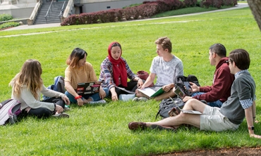 Union students enjoying a conversation near the Nott Memorial.