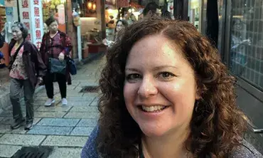 Krisanna M. Scheiter samples food in Jiufen, Taiwan.