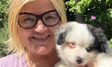 Lori Marso, the Doris Zemurray Stone Professor of Modern Literary and Historical Studies, with her puppy, Taki.