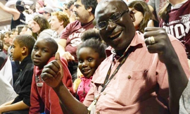 Cheikh Ndiaye and his family enjoy a Union hockey game