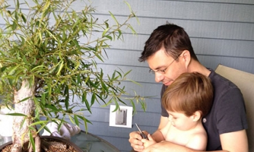 Timothy Stablein, associate professor of sociology, with his son, Charlie.