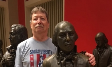 Professor Ken DeBono stands with President James Madison at the National Constitution Center in Philadelphia.