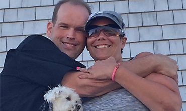 Dennis Chotkowski and wife, Kristin, with their dog, Piccolo