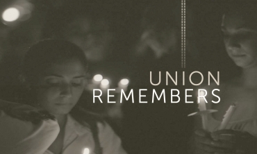 Students with candles in memory of 9/11 victims