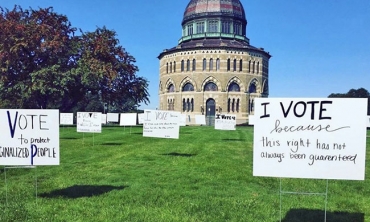 Signs in front of the Nott that state why it is important to vote.