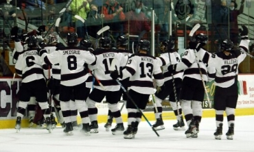 Men's hockey celebrates Division I win