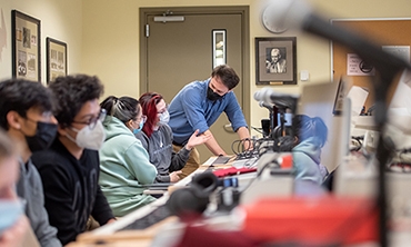 Union Music Teacher instructing students in a lab setting