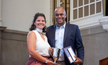 Prize Day winning student with President Harris