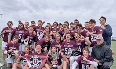 The lacrosse team celebrates its championship victory