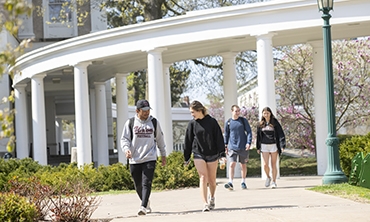 Welcome class of 2026 - students walking on campus